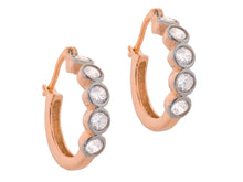 “Orbits” hoop earring
